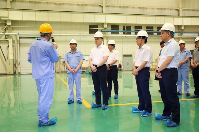 新安縣委書記、縣長王智到萬基控股集團調(diào)研